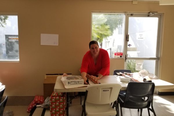 Gift Wrapping for our annual Salvation Army Adopt-a-Family initiative at our Corporate office in Tucson, AZ