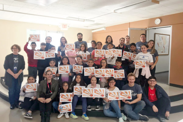 Employees from our Product Development teams volunteered to mentor students from Liberty Elementary School. The volunteers created a Coding Club for the students, who learned about coding and robotics.